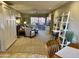 Bright living room featuring a comfortable seating area and access to a balcony at 12222 N Paradise Village Pkwy # 321, Phoenix, AZ 85032