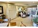 Comfortable living room with a neutral palette, a built-in murphy bed, and a relaxing atmosphere at 12222 N Paradise Village Pkwy # 321, Phoenix, AZ 85032
