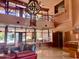 The clubhouse lobby boasts a unique chandelier and seating area near the pool entrance at 12222 N Paradise Village Pkwy # 321, Phoenix, AZ 85032