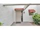 Inviting entryway with stylish accents, desert landscaping, and a sheltered walkway at 13811 N 42Nd Pl, Phoenix, AZ 85032