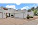 Charming home with a spacious two-car garage, desert landscaping, and striking curb appeal at 13811 N 42Nd Pl, Phoenix, AZ 85032