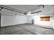 Spacious two car garage with an updated water heater and clean floors at 13811 N 42Nd Pl, Phoenix, AZ 85032