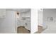 Clean, all-white kitchen with modern appliances and ample counter space at 13811 N 42Nd Pl, Phoenix, AZ 85032