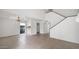 Open-concept living space with dining area and staircase at 13811 N 42Nd Pl, Phoenix, AZ 85032