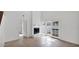 Bright living room features a fireplace and sliding doors to the outside at 13811 N 42Nd Pl, Phoenix, AZ 85032
