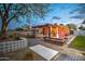 Inviting backyard features a covered patio, outdoor seating, fire pit, and tasteful landscaping at 1402 E Granada Rd, Phoenix, AZ 85006