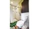 Bright bathroom features a modern toilet, shower, and unique deer antler towel rack at 1402 E Granada Rd, Phoenix, AZ 85006