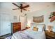 Bright bedroom features hardwood floors, soft natural light, and light blue walls at 1402 E Granada Rd, Phoenix, AZ 85006