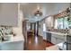 Bright kitchen offering views into the dining area, modern appliances, and stylish backsplash at 1402 E Granada Rd, Phoenix, AZ 85006