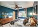 Comfortable main bedroom with sleek dresser, full bed and bright window at 1402 E Granada Rd, Phoenix, AZ 85006