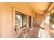 Cozy balcony offers comfortable seating and a shaded retreat with a view at 1440 N Idaho Rd # 2053, Apache Junction, AZ 85119