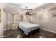 Bedroom with tile flooring and built-in headboard and shelving units at 1440 N Idaho Rd # 2053, Apache Junction, AZ 85119