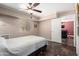Comfortable bedroom with tile flooring, ceiling fan and natural light at 1440 N Idaho Rd # 2053, Apache Junction, AZ 85119