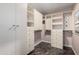Organized walk-in closet offering ample storage space with custom shelving and drawers at 1440 N Idaho Rd # 2053, Apache Junction, AZ 85119