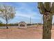 Welcoming entrance sign to Quail Creek community featuring desert landscape and attractive signage at 1440 N Idaho Rd # 2053, Apache Junction, AZ 85119