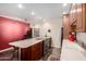 Bright kitchen features stainless appliances, bar seating, and ample counter space at 1440 N Idaho Rd # 2053, Apache Junction, AZ 85119