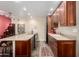 Stylish kitchen with stainless steel appliances, countertop seating, and elegant cabinetry at 1440 N Idaho Rd # 2053, Apache Junction, AZ 85119