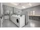 On-site laundry room featuring multiple commercial-grade washer and dryer units at 1440 N Idaho Rd # 2053, Apache Junction, AZ 85119