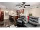 Open-concept living area with a kitchen, seating, and modern finishes at 1440 N Idaho Rd # 2053, Apache Junction, AZ 85119