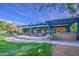 Beautiful common area with covered patios, ample seating, and lush landscaping, perfect for community gatherings at 14413 W Dahlia Dr, Surprise, AZ 85379