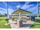 A park picnic area with a gazebo, picnic tables, and a charcoal grill for public use at 14413 W Dahlia Dr, Surprise, AZ 85379