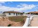 Charming single-story home with landscaped front yard and a white fence, perfect for suburban living at 1649 W Carmel Ave, Mesa, AZ 85202