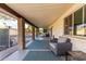 Relaxing back patio featuring a covered area, nice seating, and views of the refreshing pool at 1825 S Spruce --, Mesa, AZ 85210