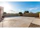 A spacious backyard with concrete flooring and privacy walls at 1825 S Spruce --, Mesa, AZ 85210