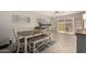 Bright dining area with seating for six, plus a sliding door to the backyard patio at 1825 S Spruce --, Mesa, AZ 85210