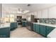 Modern kitchen features a stainless steel fridge, and custom backsplash at 1825 S Spruce --, Mesa, AZ 85210