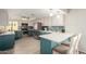 Stylish kitchen features stainless steel appliances, white countertops and two-tone cabinetry at 1825 S Spruce --, Mesa, AZ 85210