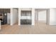 Butler's pantry with dark cabinetry, countertops, sink, and tile flooring at 18716 N 269Th Ln, Buckeye, AZ 85396