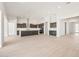 Spacious living area showcases tile flooring, a gourmet kitchen, and bright lighting at 18716 N 269Th Ln, Buckeye, AZ 85396