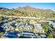 Panoramic aerial view of community with mountain backdrop and lush green landscape at 1880 E Morten Ave # 242, Phoenix, AZ 85020