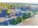 Unique aerial view showing a commercial building, parking area, and green space at 1880 E Morten Ave # 242, Phoenix, AZ 85020