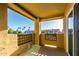An outdoor balcony with a view of surrounding palm trees and neighborhood at 1880 E Morten Ave # 242, Phoenix, AZ 85020