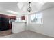 Cozy dining area with modern light fixture and large windows for natural light at 1880 E Morten Ave # 242, Phoenix, AZ 85020