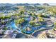 Aerial view of the community water park with lazy river and multiple pools at 1880 E Morten Ave # 242, Phoenix, AZ 85020