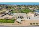 Expansive property featuring a well-manicured lawn, pool, guest house and spacious single-Gathering home at 19535 E Via De Olivos Rd, Queen Creek, AZ 85142