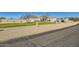 Single Gathering home with desert landscaping and partially fenced yard at 19535 E Via De Olivos Rd, Queen Creek, AZ 85142