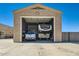 Oversized garage features parking for recreational vehicles and trucks at 19535 E Via De Olivos Rd, Queen Creek, AZ 85142