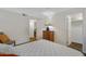 Bedroom with hardwood floors, neutral decor and multiple closets at 2025 E Campbell Ave # 114, Phoenix, AZ 85016