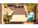 Aerial view showcasing the home's layout, including a private pool and lush backyard at 203 W Raven Dr, Chandler, AZ 85286