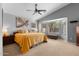 Spacious main bedroom with vaulted ceiling, large windows, and soft neutral tones at 203 W Raven Dr, Chandler, AZ 85286