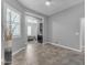 Bedroom featuring sleek flooring, access to bedroom and modern decor at 20340 E Camacho Rd, Queen Creek, AZ 85142