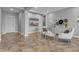 Bright and airy living room with modern decor, neutral color scheme, and tile flooring at 20340 E Camacho Rd, Queen Creek, AZ 85142