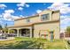 Spacious backyard with swimming pool, patio, and playset, perfect for Gathering activities at 21266 S 213Th Pl, Queen Creek, AZ 85142