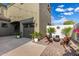 Cozy backyard patio with comfortable seating, a charming fire pit, and manicured plants at 21266 S 213Th Pl, Queen Creek, AZ 85142