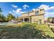 Large backyard featuring a pool, covered patio, and play area on a lush lawn at 21266 S 213Th Pl, Queen Creek, AZ 85142