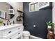 A beautifully designed bathroom with a modern vanity and stylish decor at 21266 S 213Th Pl, Queen Creek, AZ 85142